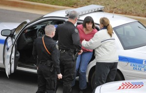 Amy Bishop, the perpetrator in the UAH shootings, being led away by police